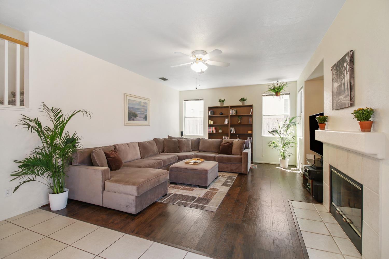 11568 Pyrites Court Gold River, CA 95670 - Photo 12 of 60 a living room with furniture and a fireplace