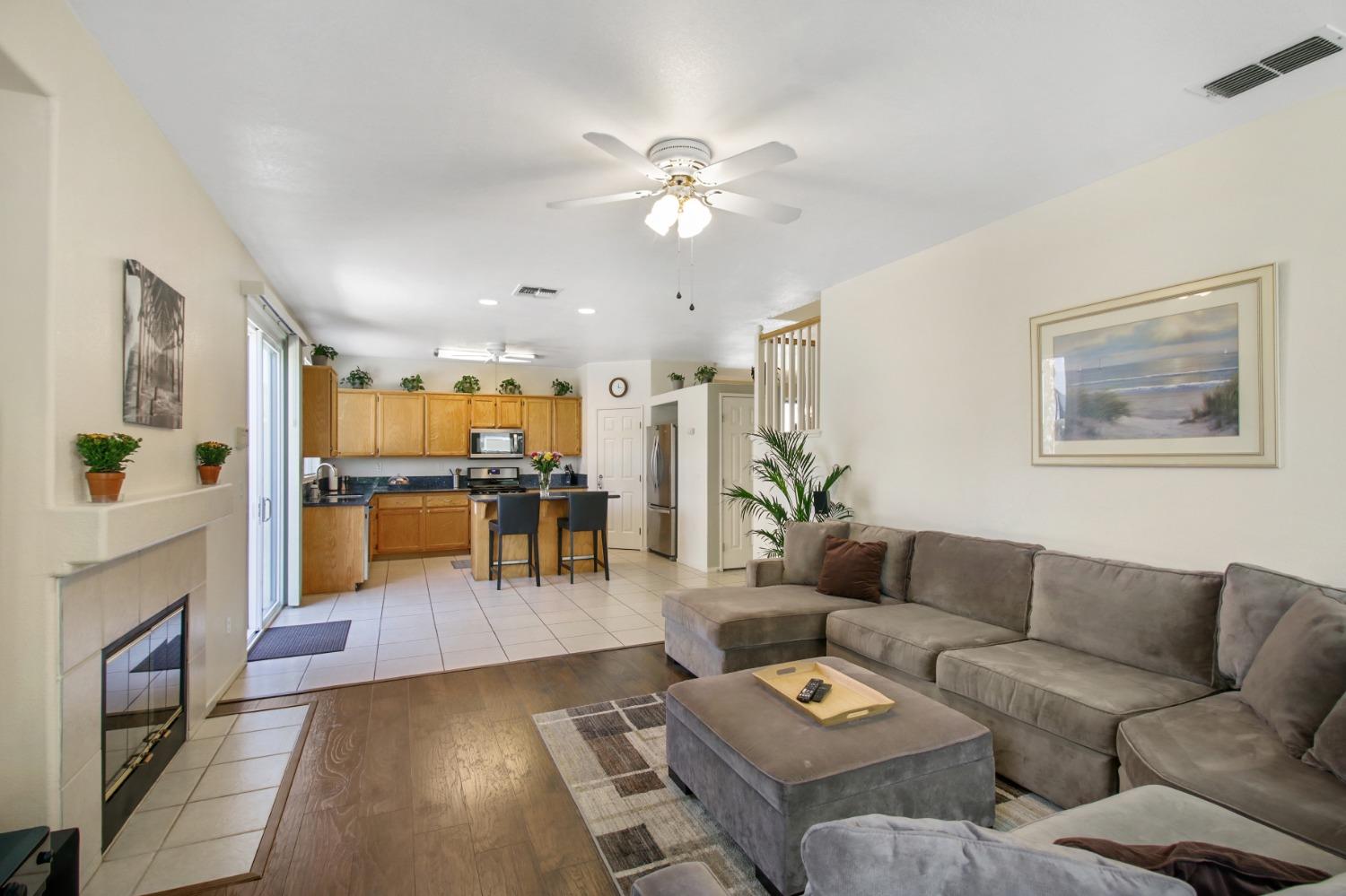 11568 Pyrites Court Gold River, CA 95670 - Photo 14 of 60 a living room with furniture and a fireplace