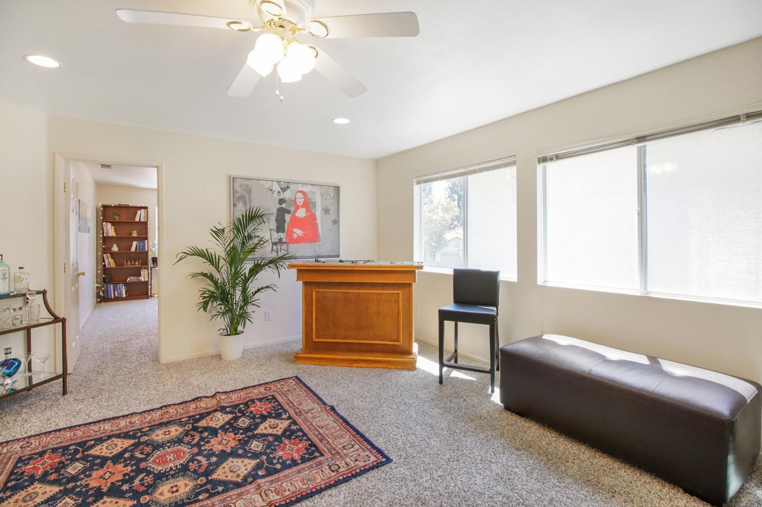 11568 Pyrites Court Gold River, CA 95670 - Photo 24 of 60 a living room with furniture and a window