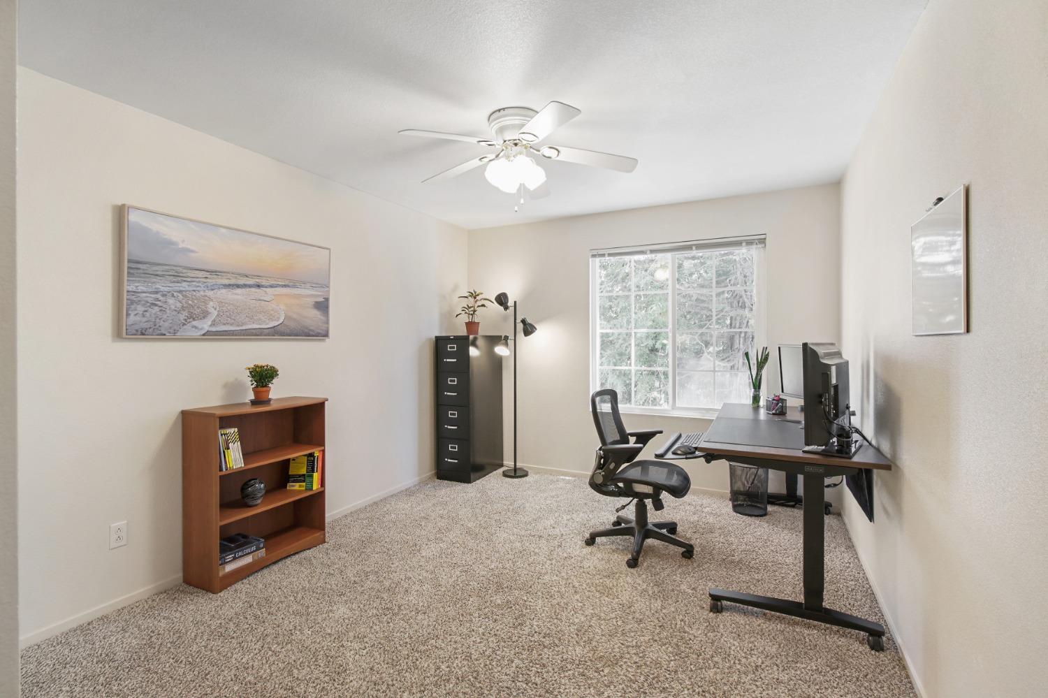 11568 Pyrites Court Gold River, CA 95670 - Photo 36 of 60 a view of a workspace with furniture and a window