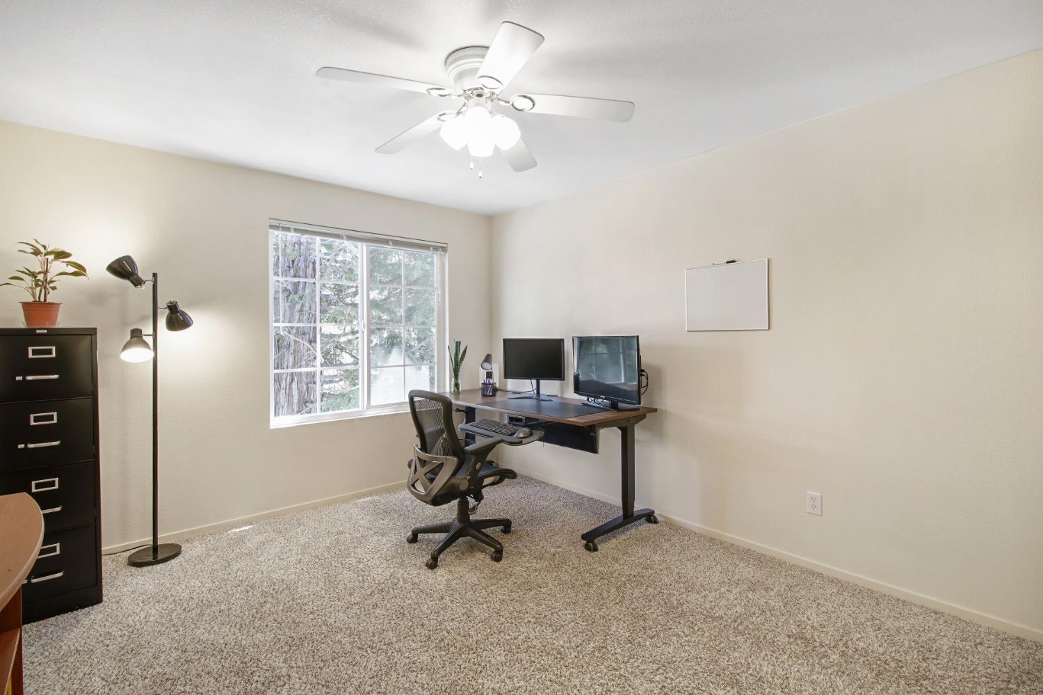 11568 Pyrites Court Gold River, CA 95670 - Photo 37 of 60 a view of a workspace with furniture and a window