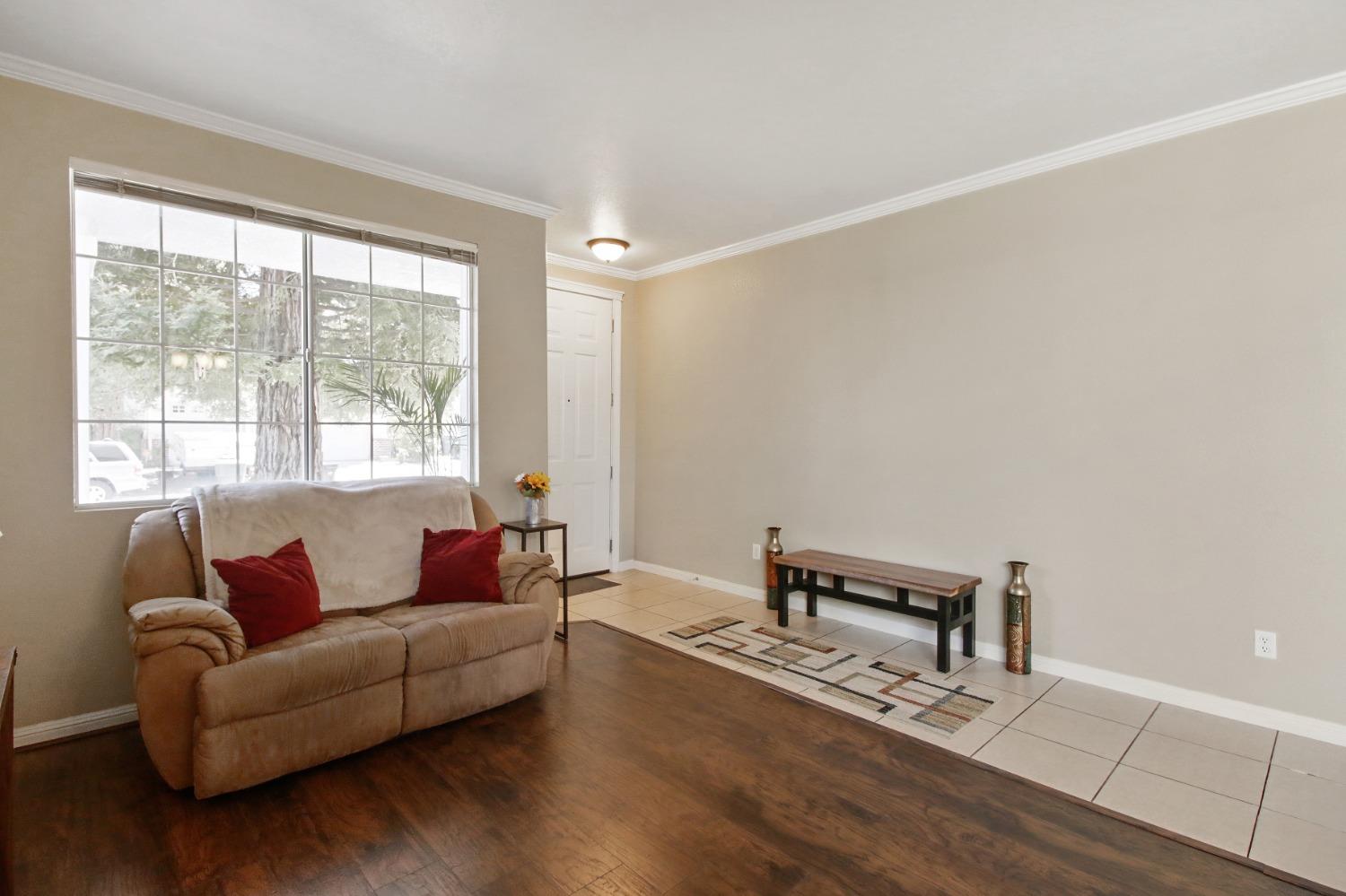 11568 Pyrites Court Gold River, CA 95670 - Photo 4 of 60 a living room with furniture and a window