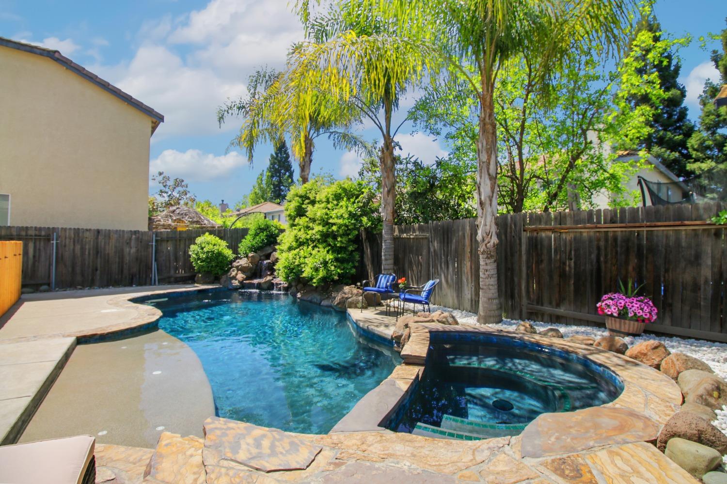 11568 Pyrites Court Gold River, CA 95670 - Photo 46 of 60 a garden view with a seating space