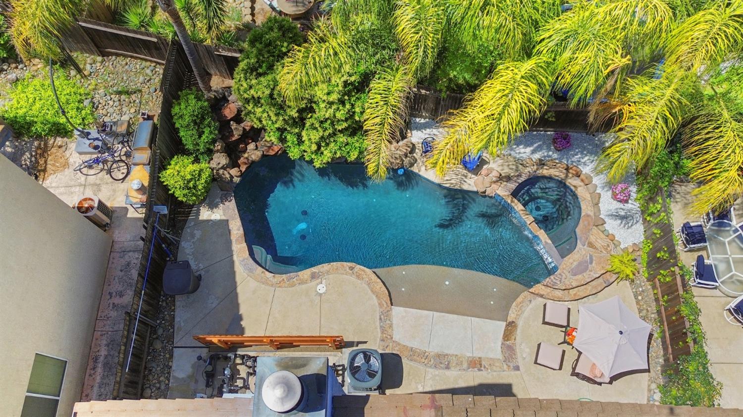 11568 Pyrites Court Gold River, CA 95670 - Photo 50 of 60 an aerial view of a house with a swimming pool