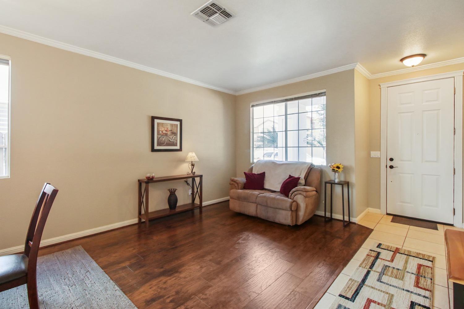 11568 Pyrites Court Gold River, CA 95670 - Photo 5 of 60 a living room with furniture and a window
