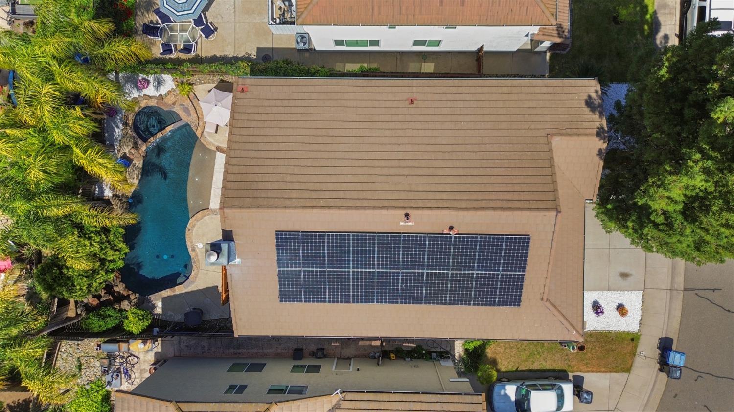 11568 Pyrites Court Gold River, CA 95670 - Photo 51 of 60 a view of a door and chair and table in the backyard