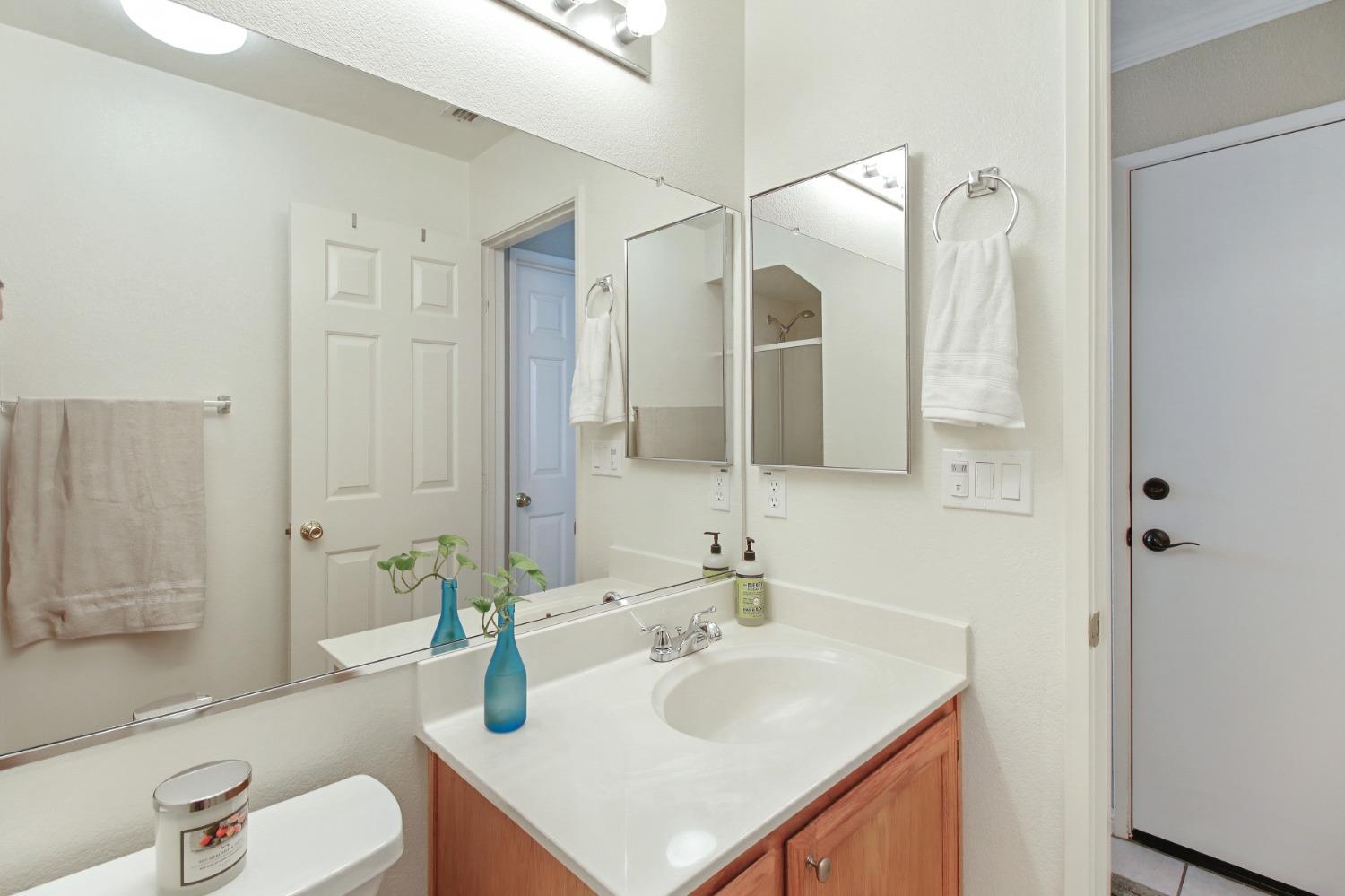 11568 Pyrites Court Gold River, CA 95670 - Photo 9 of 60 a bathroom with a sink toilet and shower