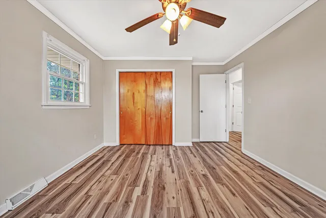 a view of an empty room and window