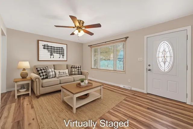 a kitchen with cabinets stainless steel appliances and a counter space