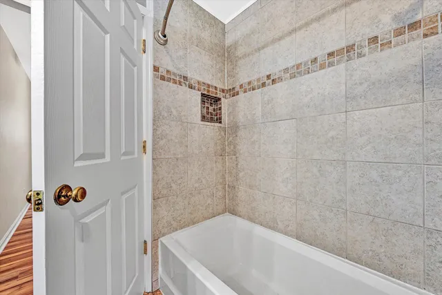 a view of a hallway with closet