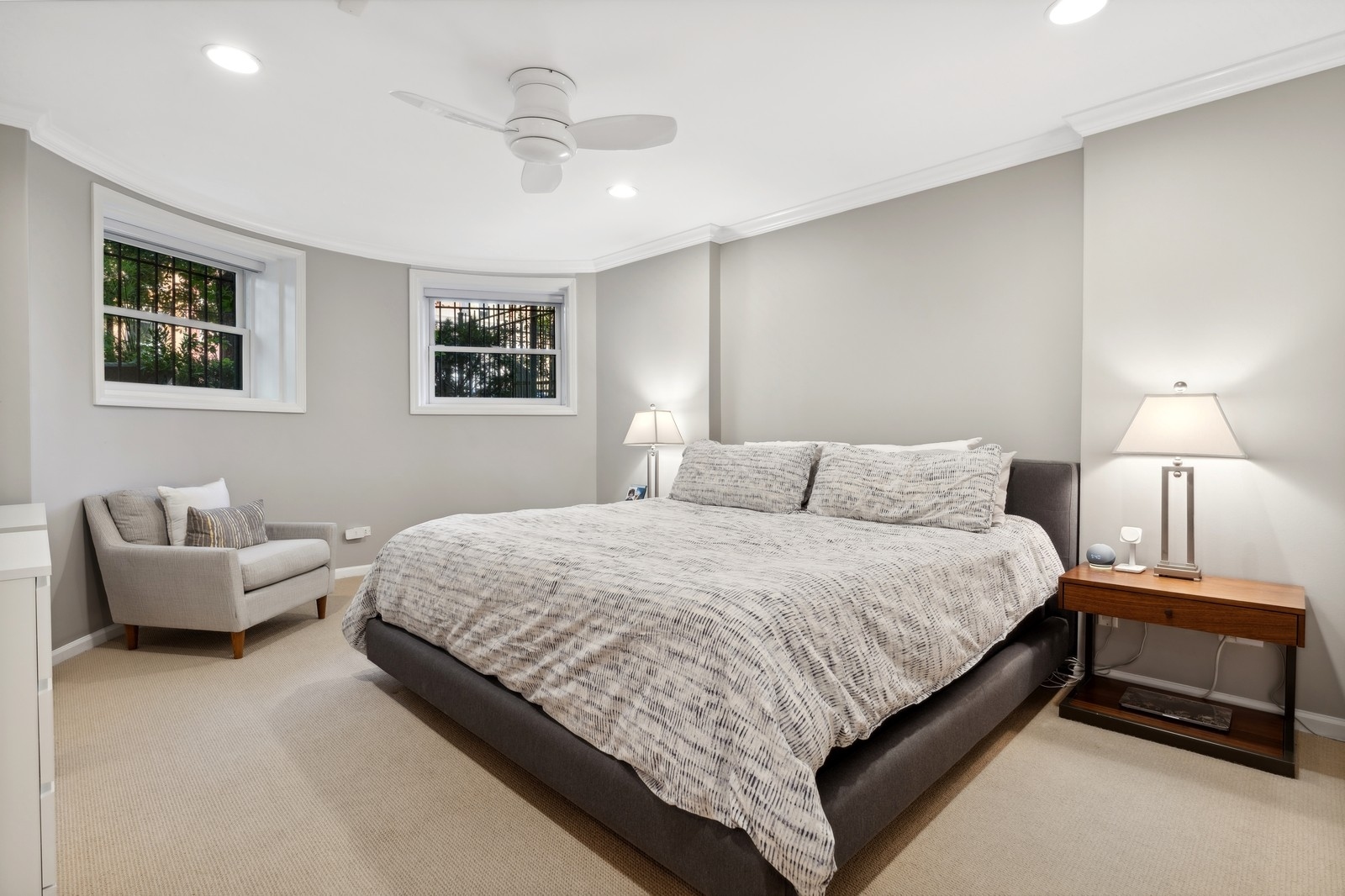 2027 North Howe Street, Unit 1 Chicago, IL 60614 - Photo 12 of 28 a bedroom with bed and a couch