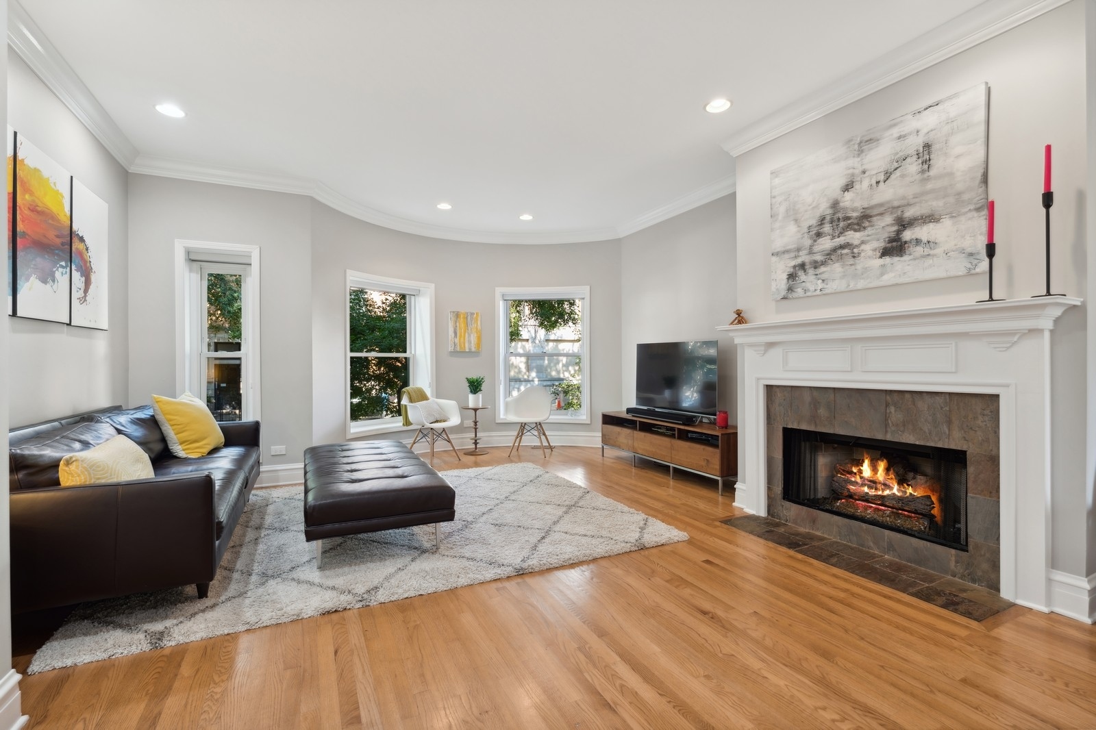 2027 North Howe Street, Unit 1 Chicago, IL 60614 - Photo 2 of 28 a living room with furniture and a fireplace