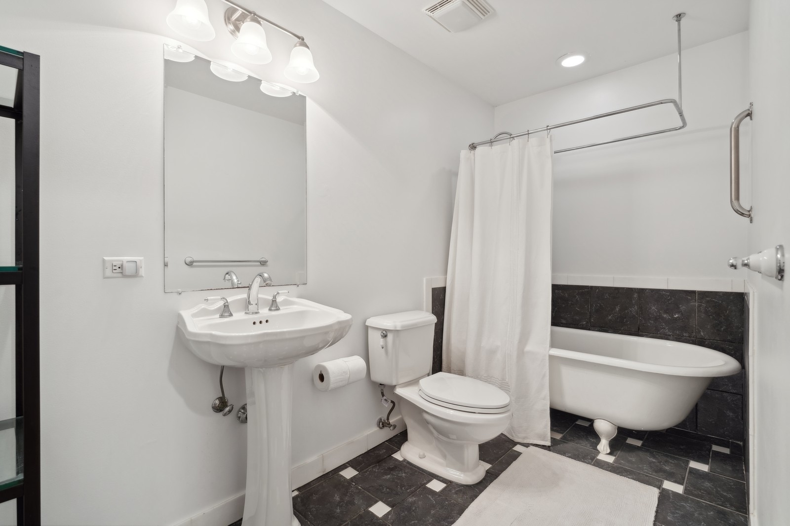 2027 North Howe Street, Unit 1 Chicago, IL 60614 - Photo 22 of 28 a bathroom with a sink toilet and shower