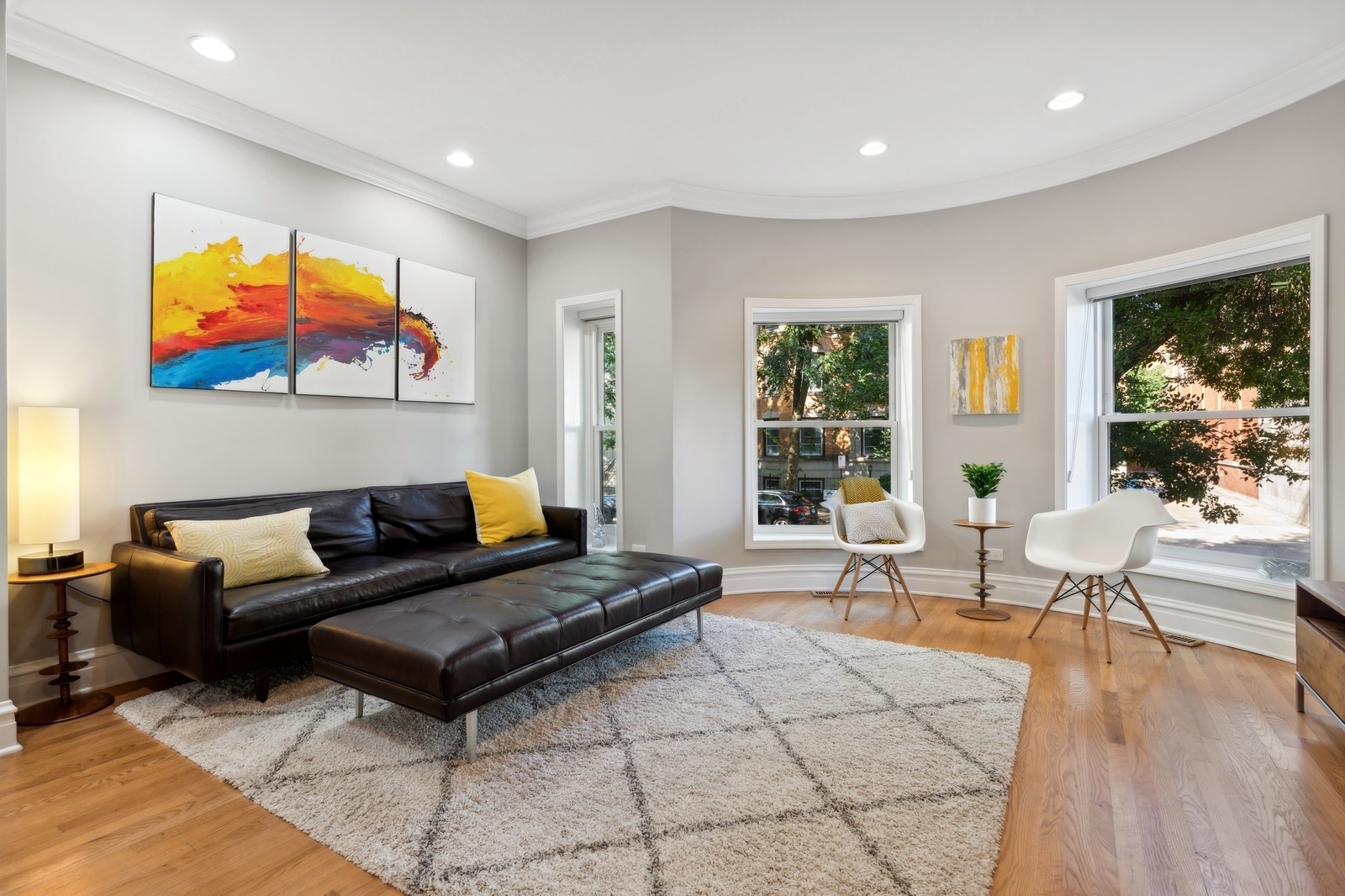 2027 North Howe Street, Unit 1 Chicago, IL 60614 - Photo 3 of 28 a living room with furniture a rug and a large window