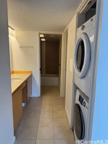 a view of a kitchen with washer and dryer
