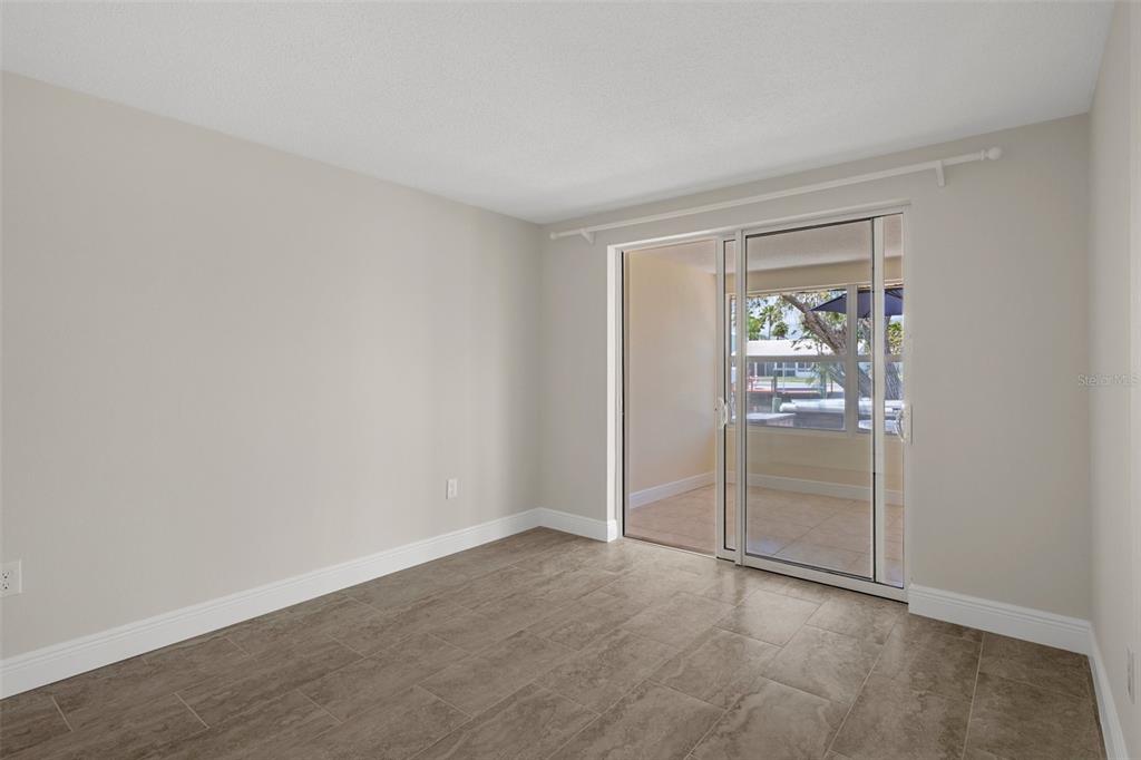 4937 Dory Drive New Port Richey, FL 34652 - Photo 24 of 68 an empty room with windows