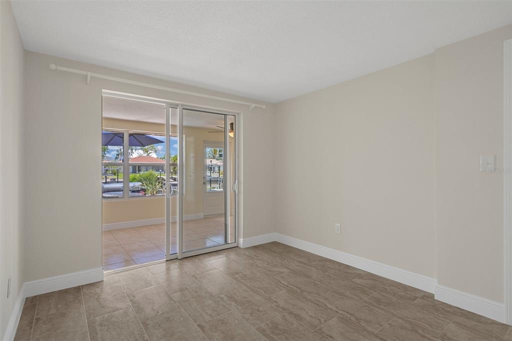 4937 Dory Drive New Port Richey, FL 34652 - Photo 26 of 68 wooden floor in an empty room