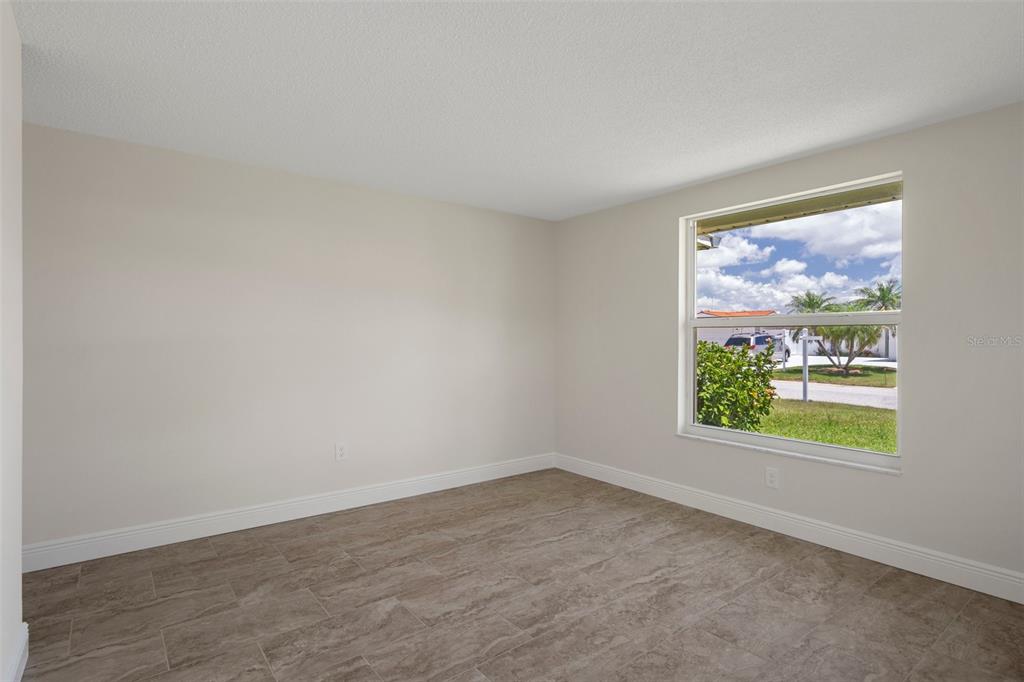 4937 Dory Drive New Port Richey, FL 34652 - Photo 33 of 68 an empty room with a window