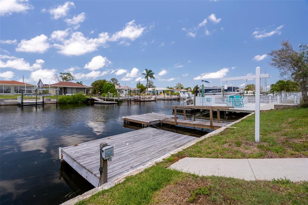 4937 Dory Drive New Port Richey, FL 34652 - Photo 42 of 68 a view of a lake with houses