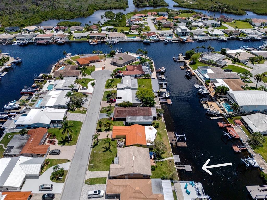 4937 Dory Drive New Port Richey, FL 34652 - Photo 47 of 68 an aerial view of a city with lake view