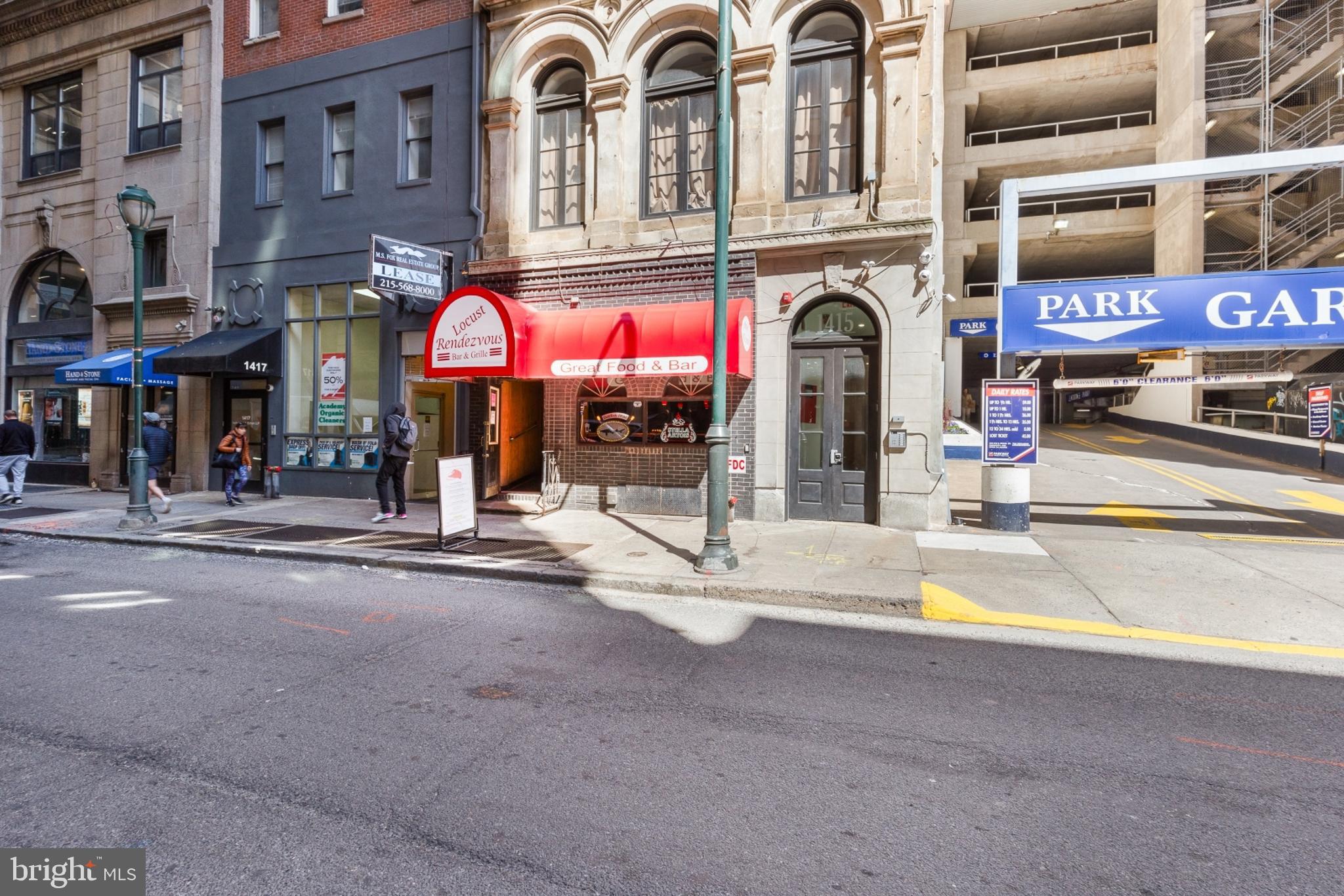 1415 Locust Street, Unit 201 Philadelphia, PA 19102 - Photo 20 of 20 a view of a building with street