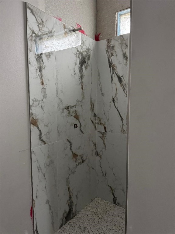 1469 Dragonstone Court Corpus Christi, TX 78415 - Photo 2 of 3 a bathroom with a shower