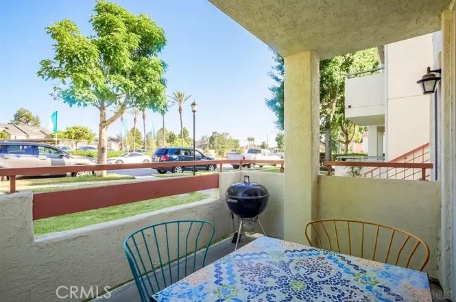 445 Ribbon Beach Way, Unit 278 Oceanside, CA 92058 - Photo 13 of 19 a balcony with couple of chairs and a potted plant