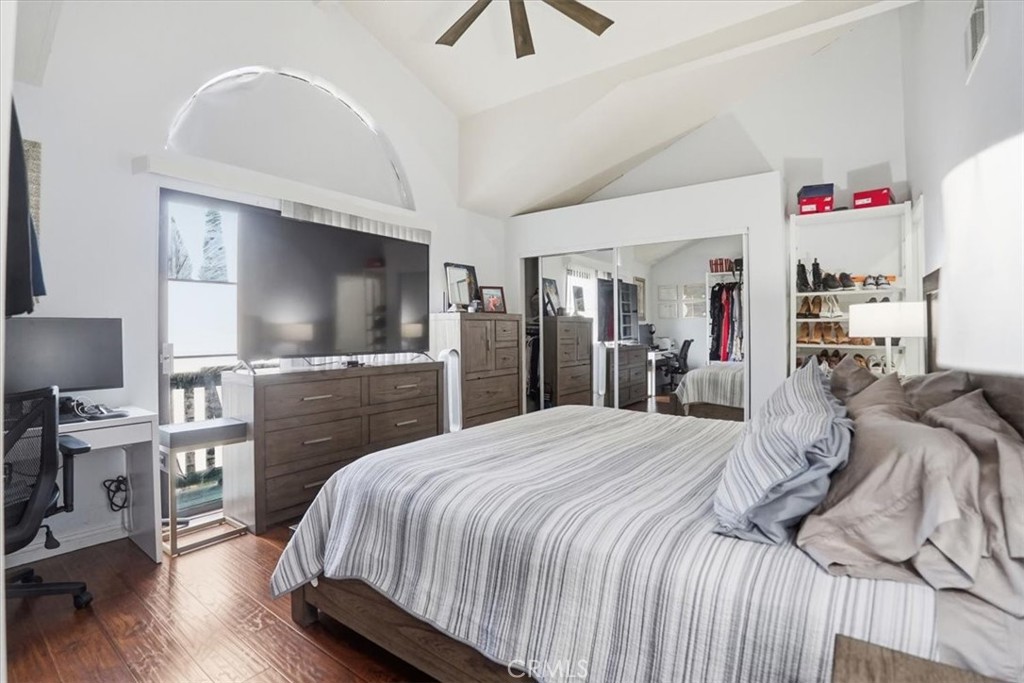 14325 Foothill Boulevard, Unit 9 Sylmar, CA 91342 - Photo 18 of 43 a bedroom with a bed and a flat screen tv