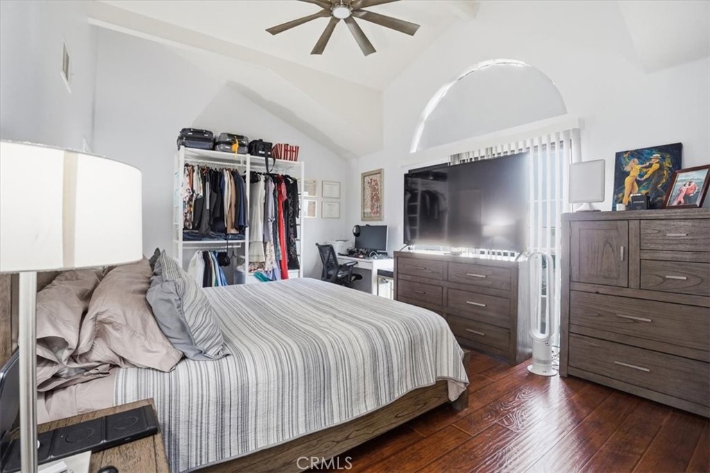 14325 Foothill Boulevard, Unit 9 Sylmar, CA 91342 - Photo 20 of 43 a bedroom with a bed and a flat screen tv