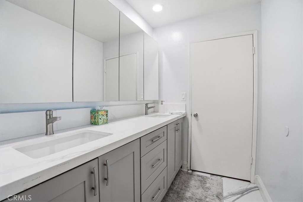 14325 Foothill Boulevard, Unit 9 Sylmar, CA 91342 - Photo 22 of 43 a utility room with cabinets