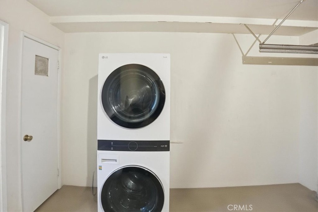 14325 Foothill Boulevard, Unit 9 Sylmar, CA 91342 - Photo 31 of 43 a close up view of a washer and dryer