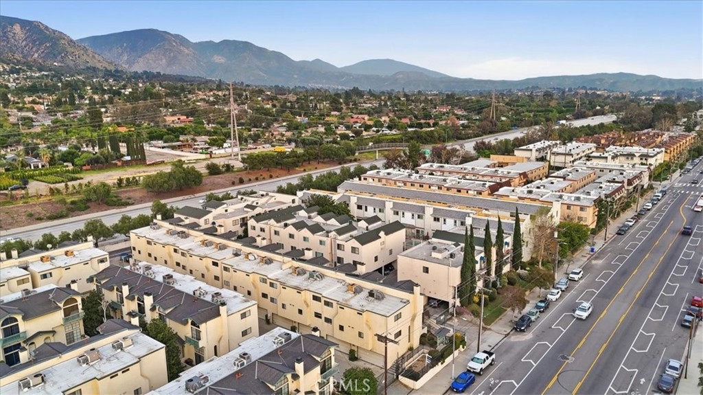 14325 Foothill Boulevard, Unit 9 Sylmar, CA 91342 - Photo 39 of 43 a view of a city with a mountain