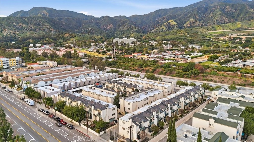 14325 Foothill Boulevard, Unit 9 Sylmar, CA 91342 - Photo 40 of 43 a view of a city with mountain