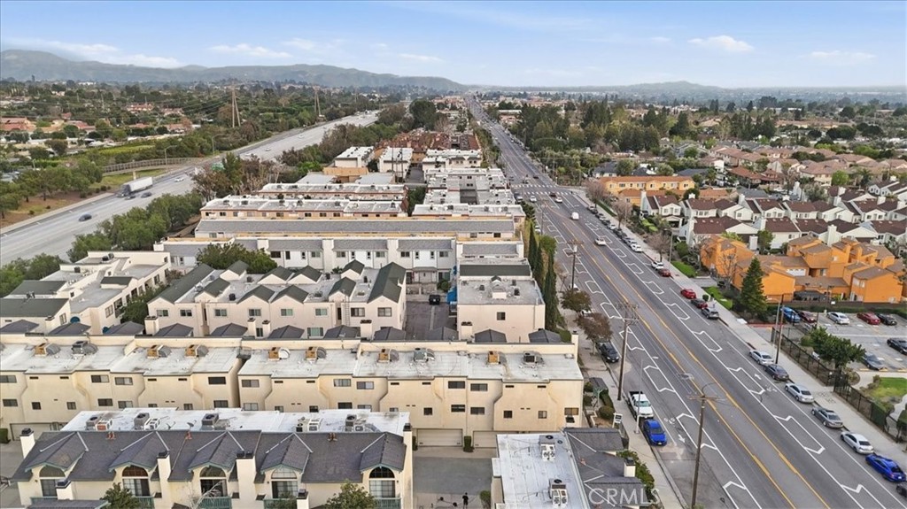 14325 Foothill Boulevard, Unit 9 Sylmar, CA 91342 - Photo 41 of 43 a view of a city with tall buildings