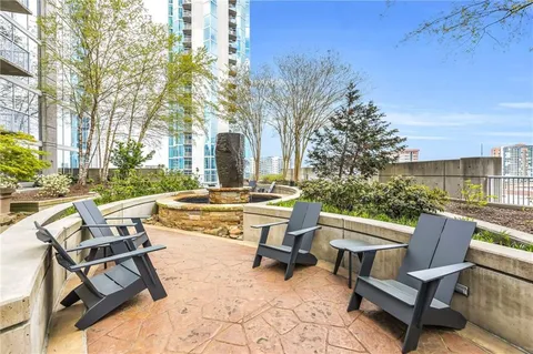 a view of a patio with a yard