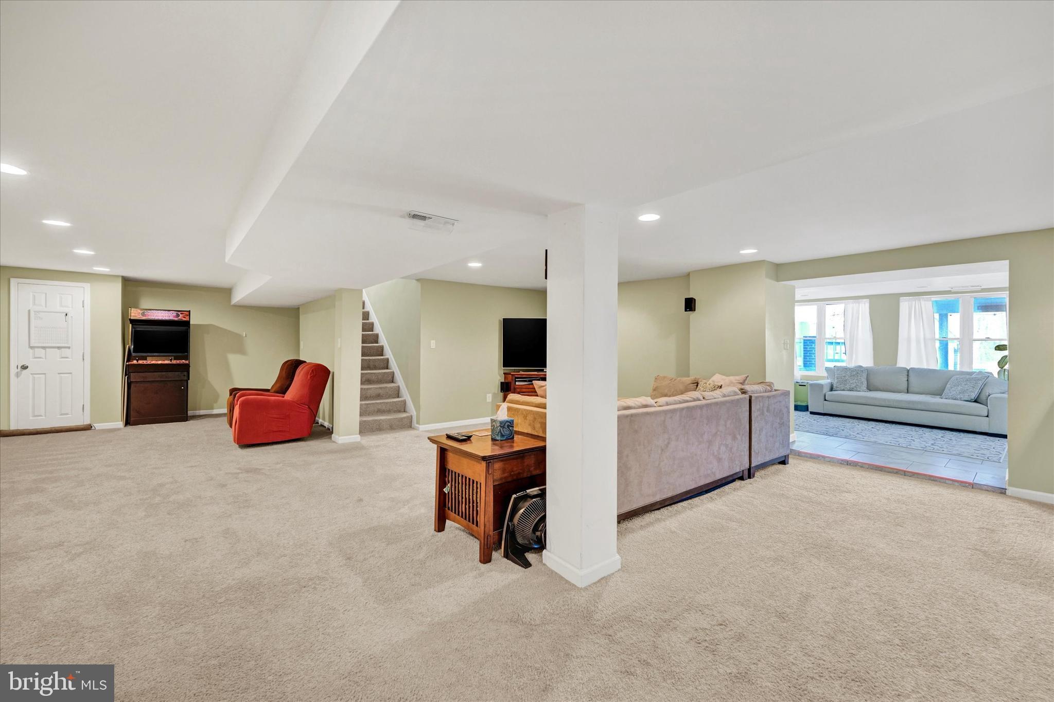 9630 10th Avenue Baltimore, MD 21234 - Photo 23 of 35 a living room with furniture and a wooden floor