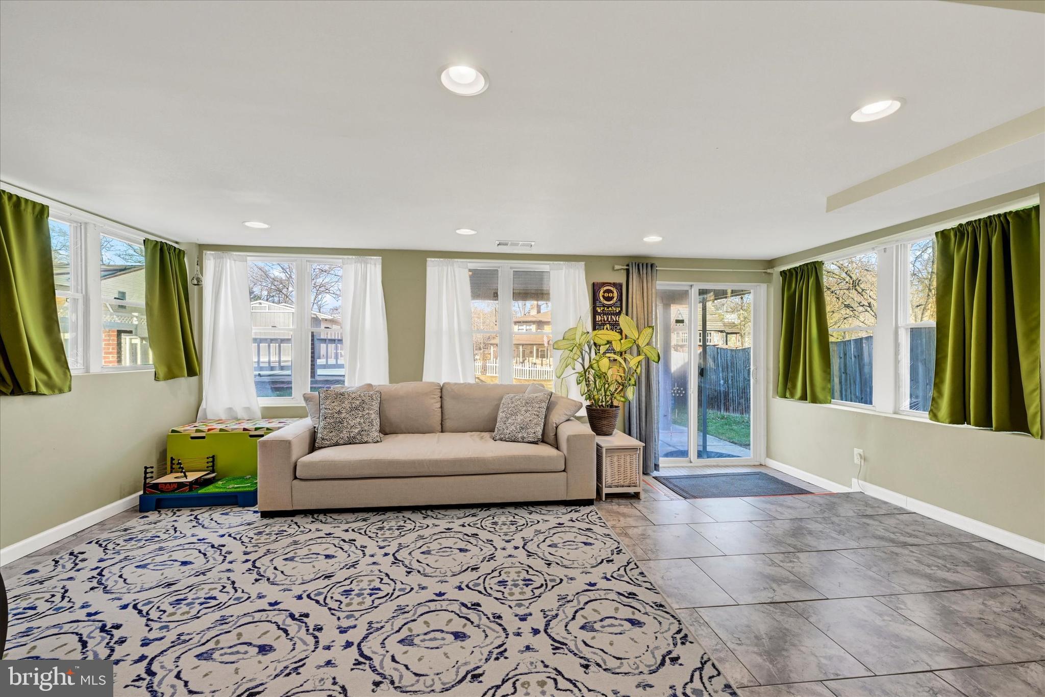 9630 10th Avenue Baltimore, MD 21234 - Photo 25 of 35 a living room with furniture and a large window