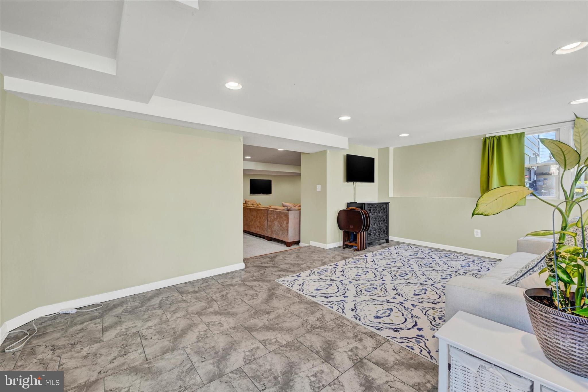 9630 10th Avenue Baltimore, MD 21234 - Photo 26 of 35 a view of a kitchen with a sink and cabinets