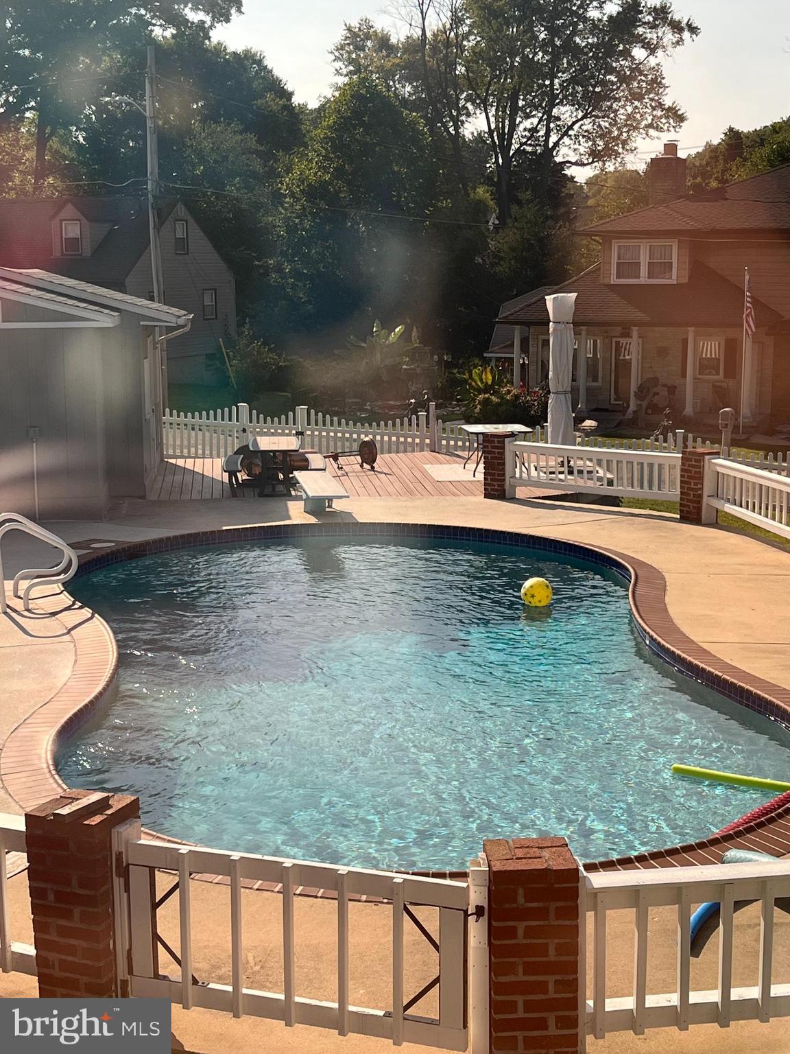 9630 10th Avenue Baltimore, MD 21234 - Photo 32 of 35 a view of a backyard with swimming pool