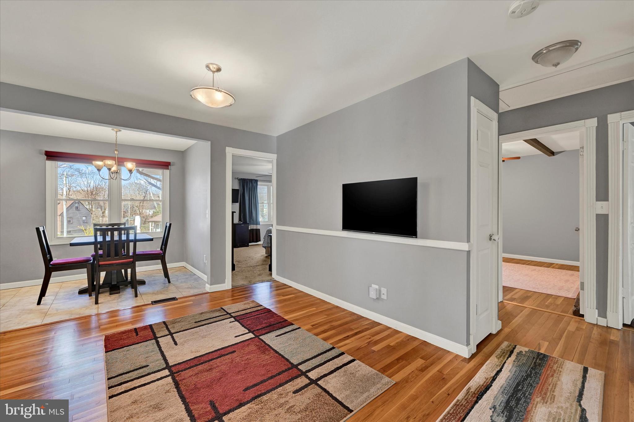 9630 10th Avenue Baltimore, MD 21234 - Photo 7 of 35 a living room with furniture and a flat screen tv
