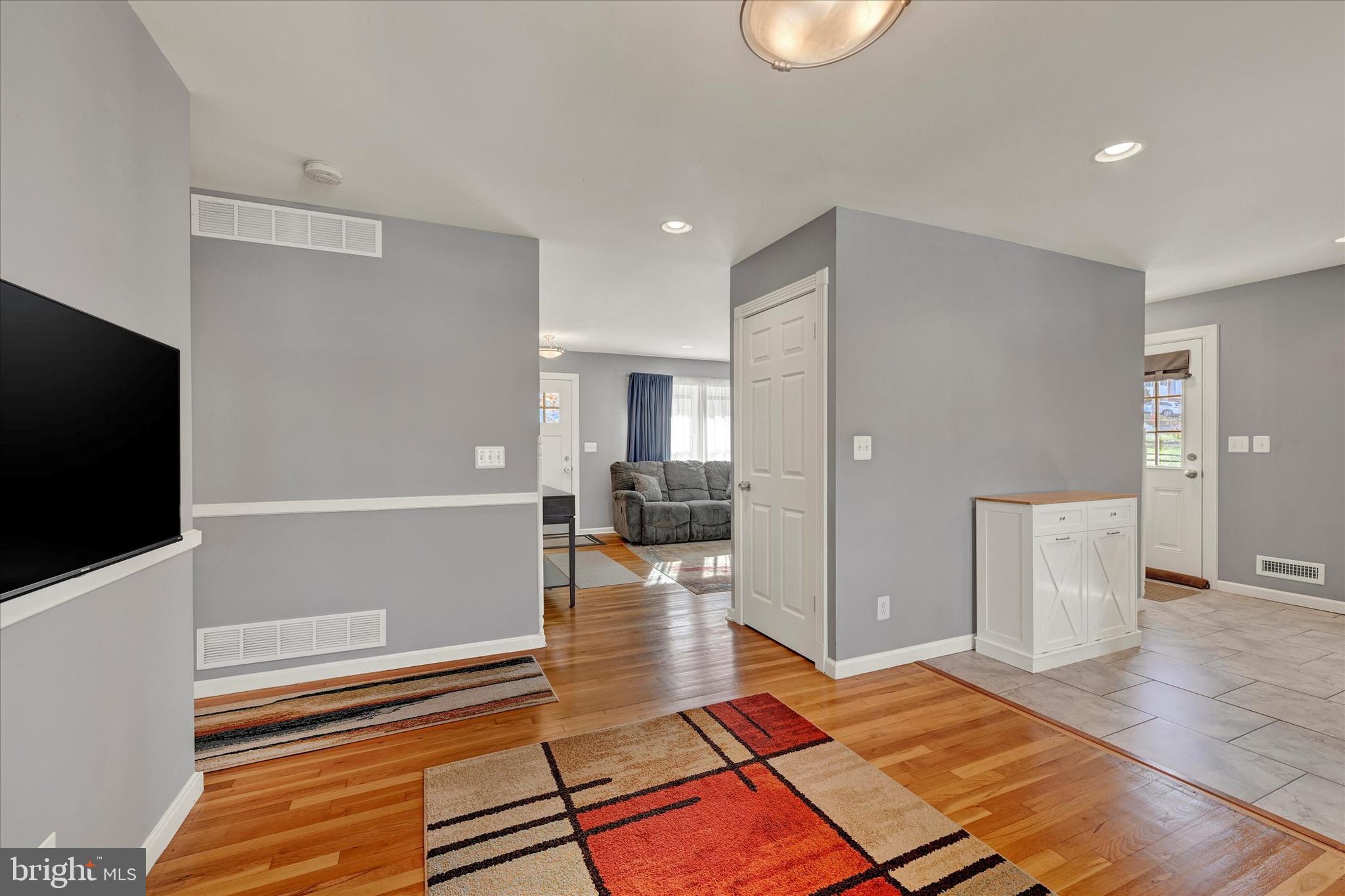 9630 10th Avenue Baltimore, MD 21234 - Photo 8 of 35 a view of a livingroom with wooden floor