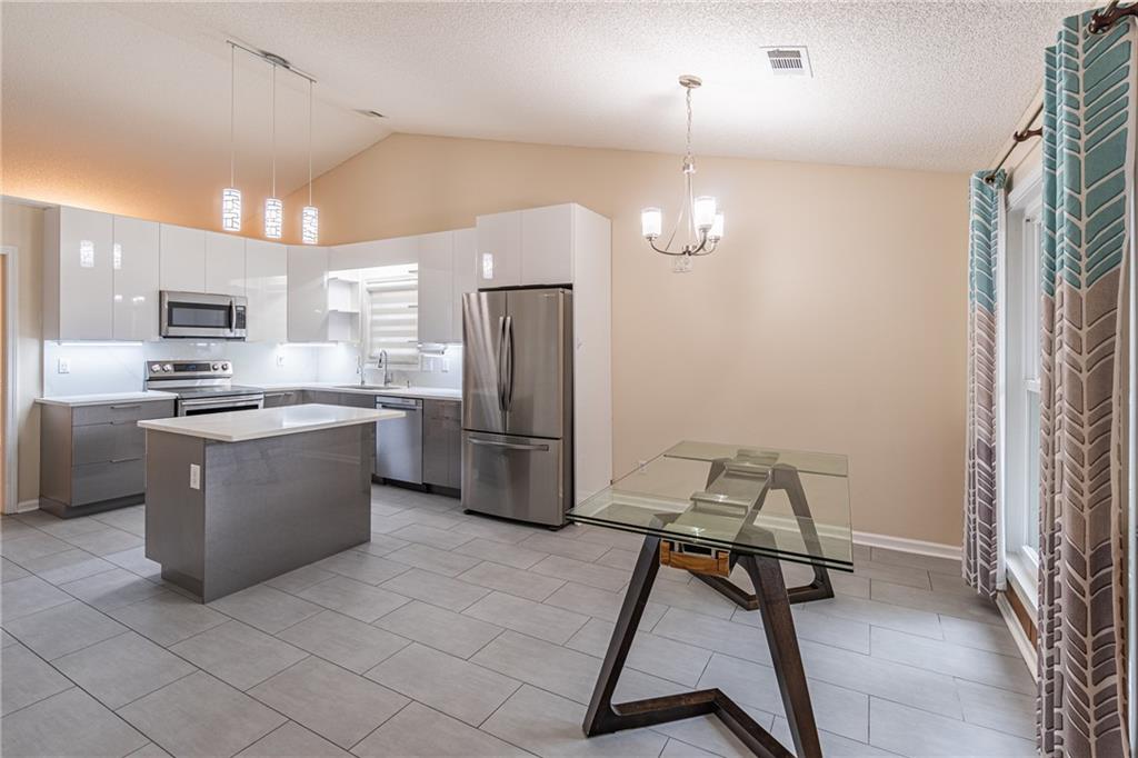 1296 Mandalay Court Southwest Lilburn, GA 30047 - Photo 9 of 21