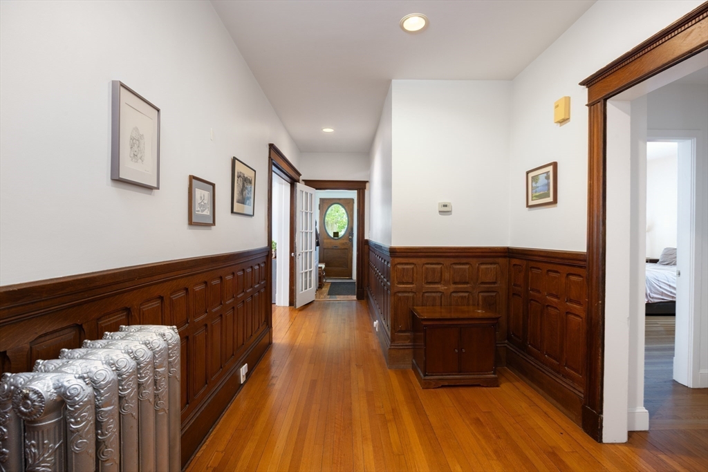 51 Naples Road Brookline, MA 02446 - Photo 12 of 16 a kitchen with wooden floors and a sink