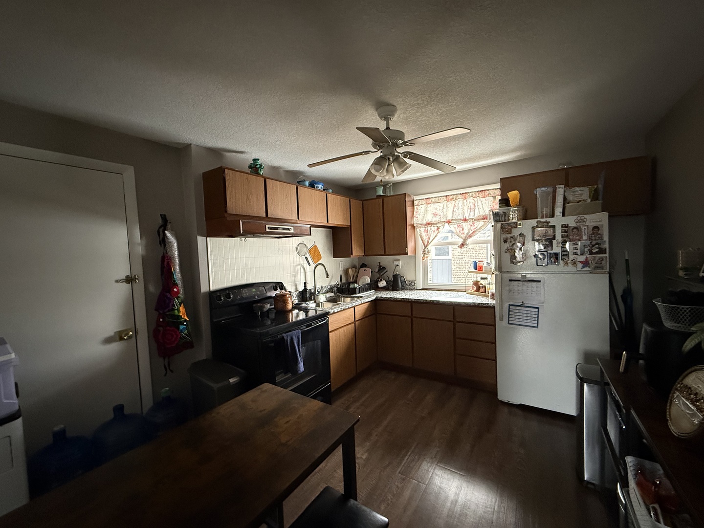 382 North Birch Street Manteno, IL 60950 - Photo 10 of 15 a kitchen with a refrigerator and a stove top oven