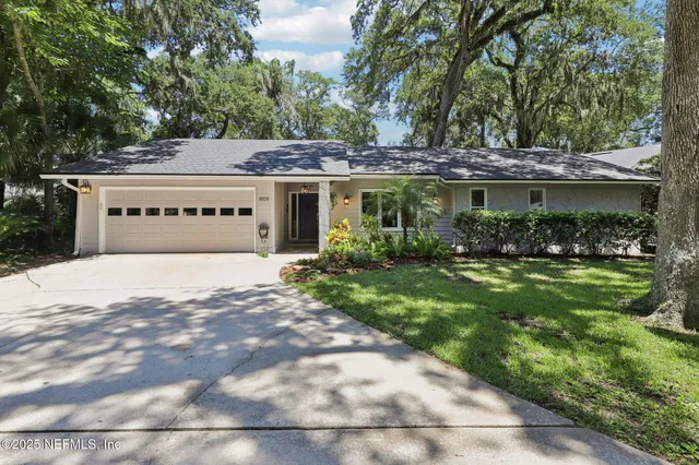 a house with trees in front of it