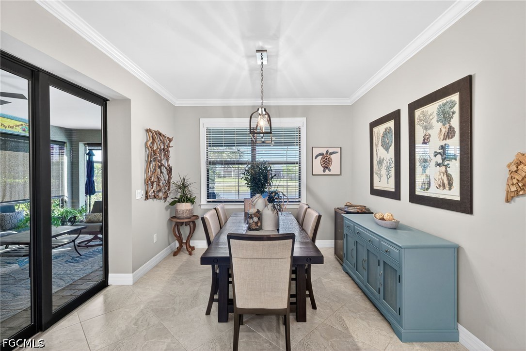 11932 Bourke Place Fort Myers, FL 33913 - Photo 16 of 44 a dining room with furniture window and outside view