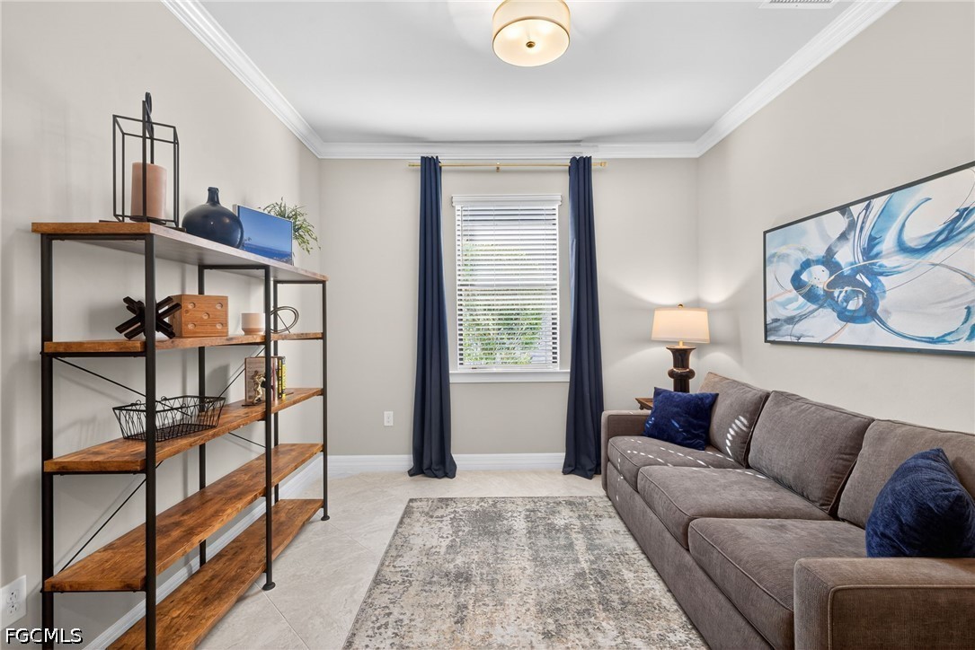 11932 Bourke Place Fort Myers, FL 33913 - Photo 26 of 44 a living room with furniture and a window