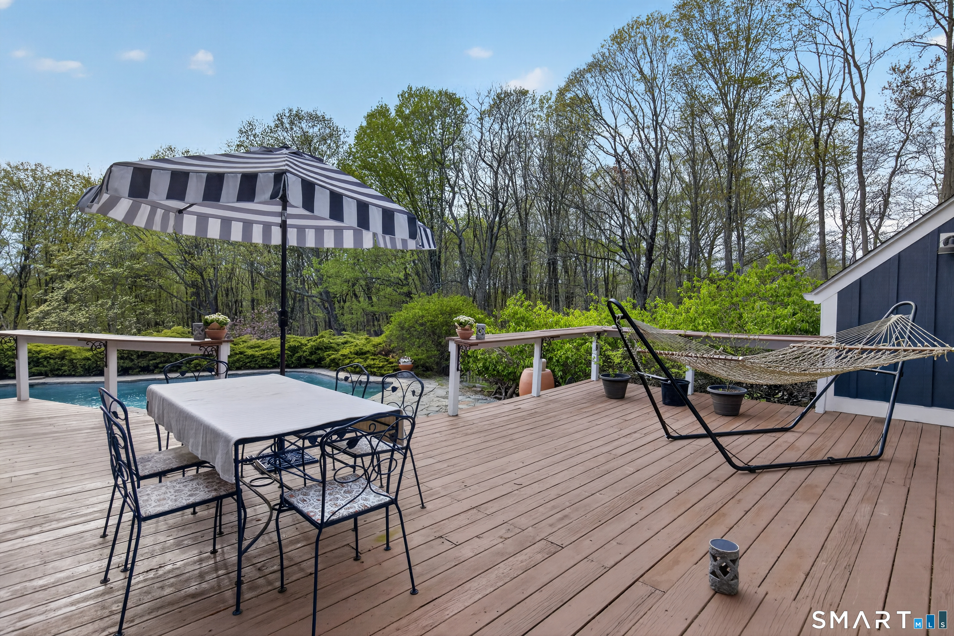 95 Chestnut Hill Road Killingworth, CT 06419 - Photo 22 of 40 Convenient access from the kitchen to the deck and pool.