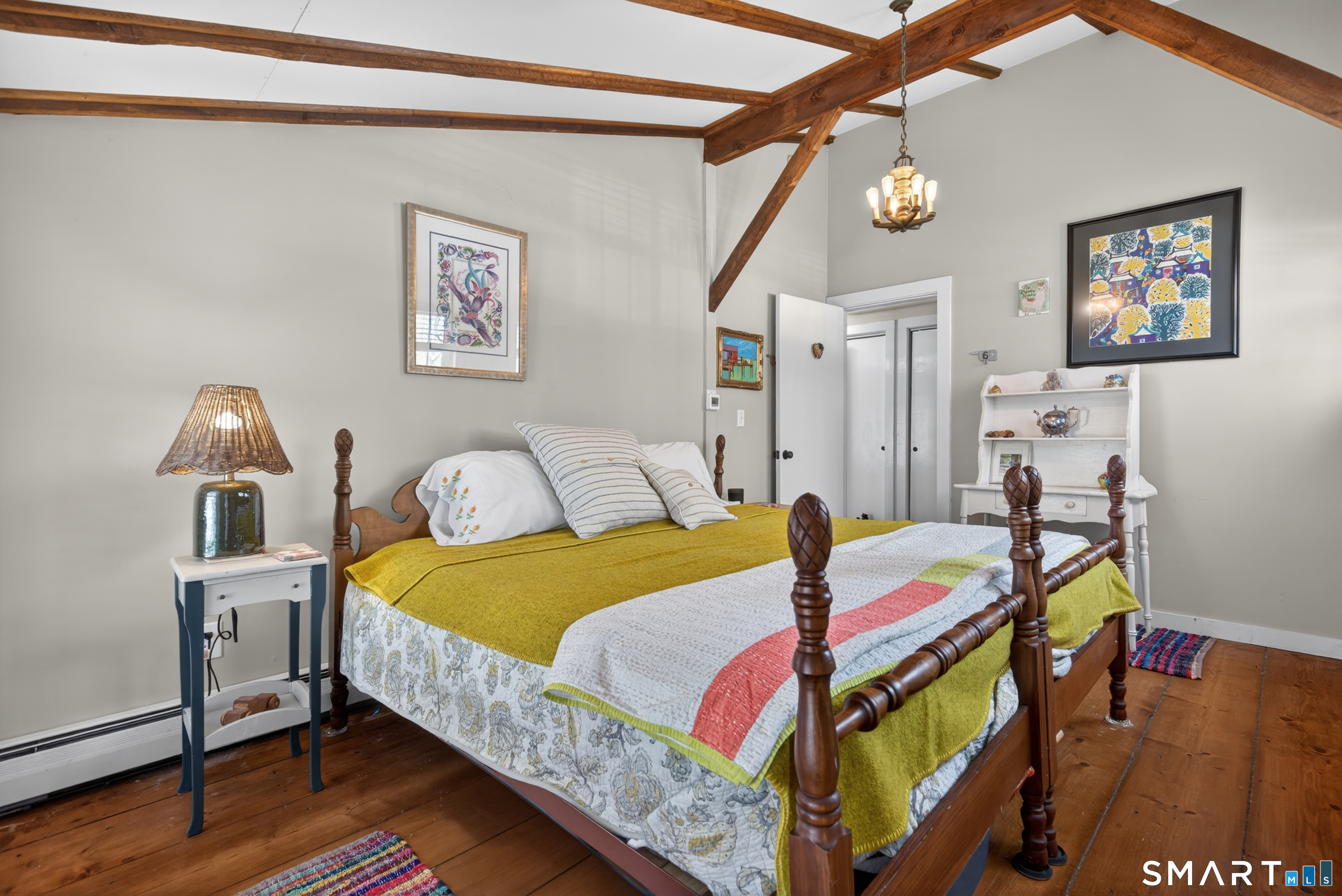 95 Chestnut Hill Road Killingworth, CT 06419 - Photo 26 of 40 Beautiful vaulted ceilings and beams in the 2nd bedroom on the main level.