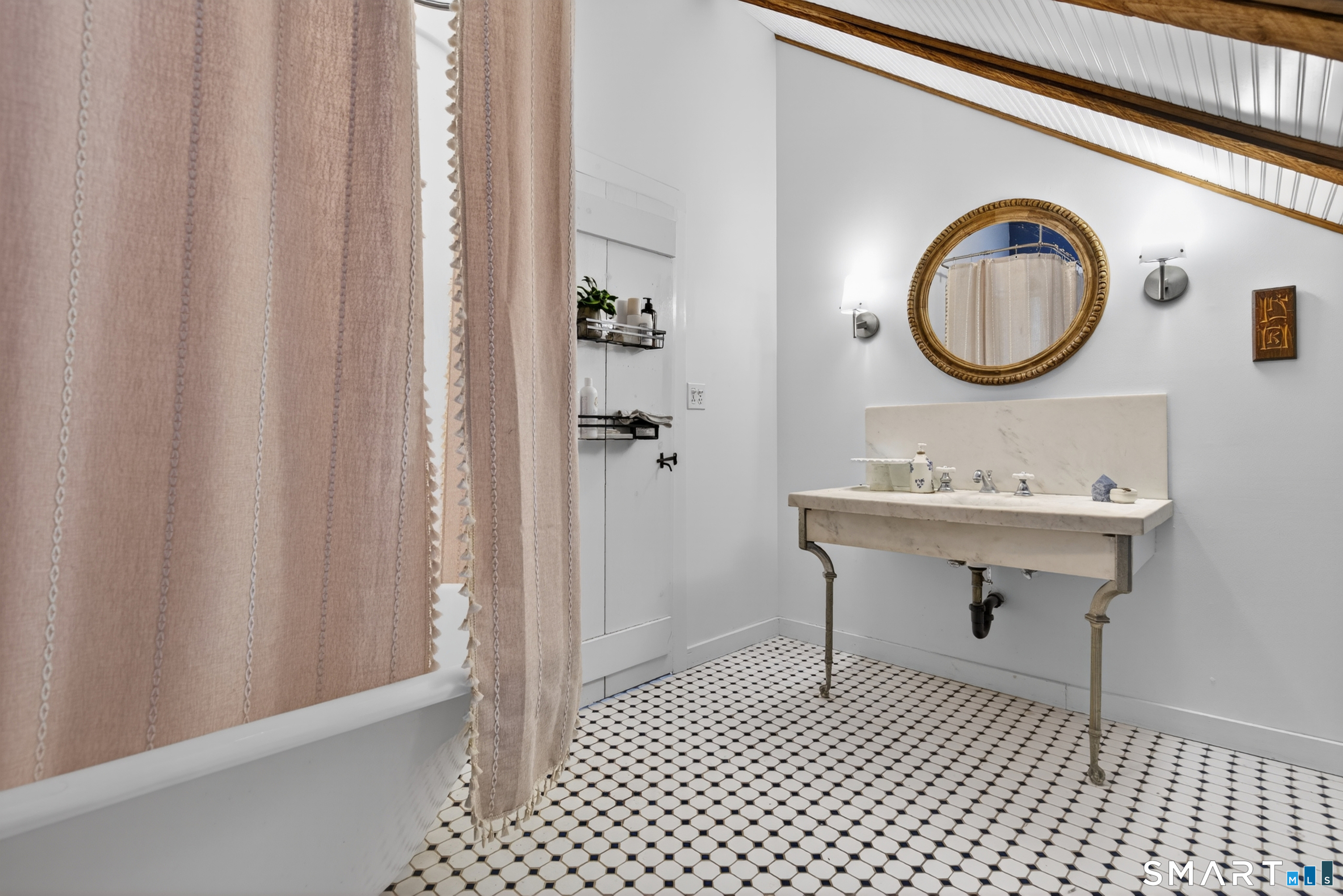 95 Chestnut Hill Road Killingworth, CT 06419 - Photo 32 of 40 Primary Suite Bath with clawfoot tub and the 2nd marble sink from the Taft Hotel.
